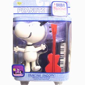 Snoopy com piano que emite música 
